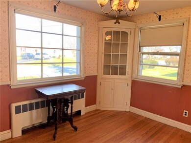 Dining room has built in cabinet and closet for ex