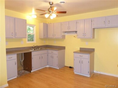 Large open kitchen with updates including laminate