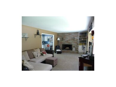 Newer Carpet. Wonderful Brick Fireplace with Built