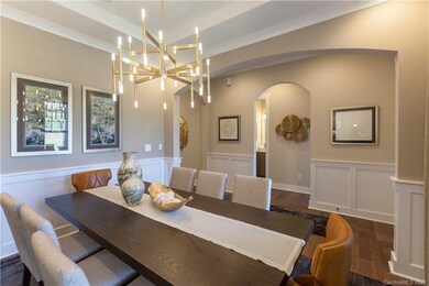 Formal Dining room.  Notice the upgraded wainscoti