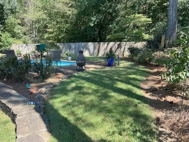 Entertain Family & Friends in this large, private backyard