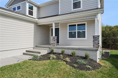 903 Reed Dr, Raymore, MO 64083 - photo 2