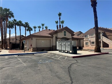 View of front of house with stucco siding, uncover