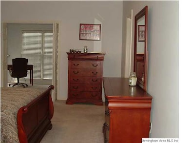 Spacious master bedroom suite includes built-in bo