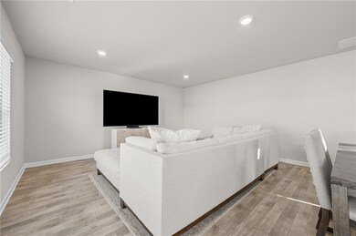 Living room featuring light wood style flooring