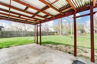 Rear covered patio and yard