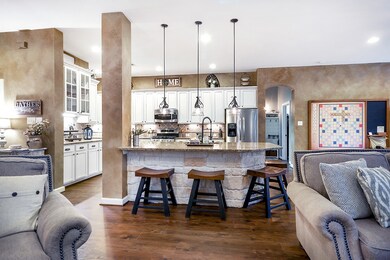 Large kitchen that opens to living and breakfast r