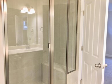 Shower in Master with tile surround and bench