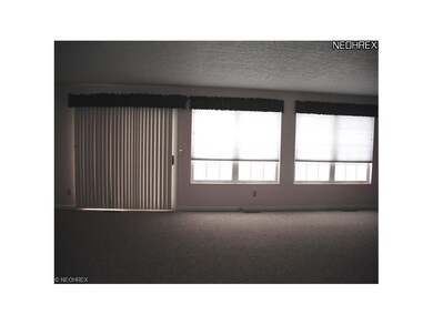great room with entry to patio