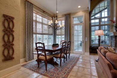 Casual dining nook looking out to back patio and pool