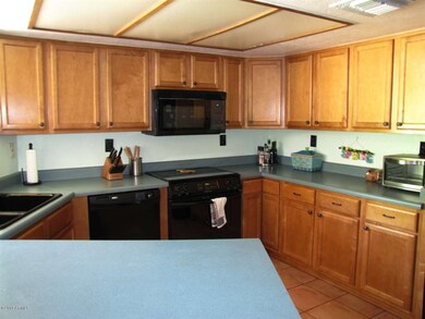 Kitchen with maple cabinets