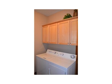 Laundry Area. Laundry/mudroom with maple cabinets