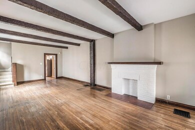 126 Living Room into Dining Room