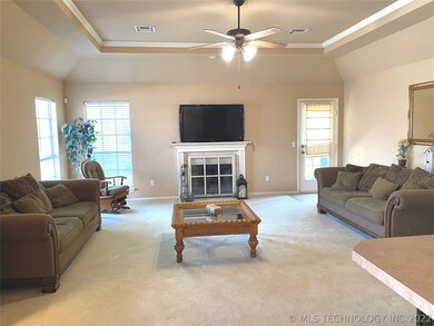 Generous living room area equipped with a gas/wood