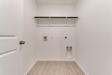 Washroom with hookup for a washing machine, gas dr