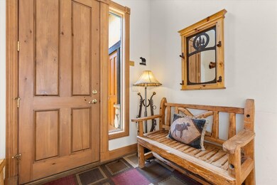 Inviting entryway with seating to remove your shoe