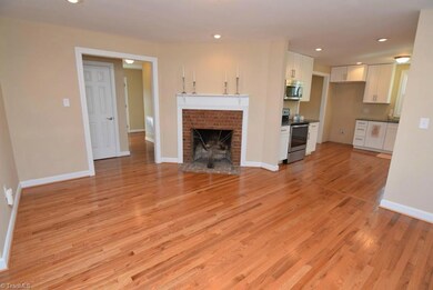 Open concept den. Hardwoods