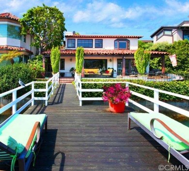 View of home from platform leading to dock