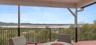 Deck featuring a water view