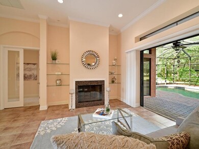 Formal Living Room with fireplace,  built - in gla