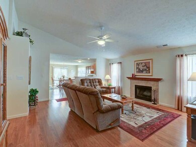 Great Room. Great Rm with beautiful wood burn ing fireplace.
