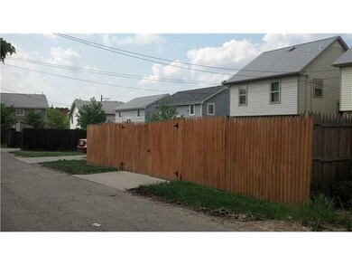 Exterior Front. Neighborhood from Back Alley