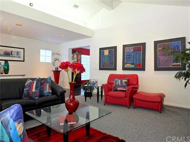 Living room with entry into the Dining Room & Kitc