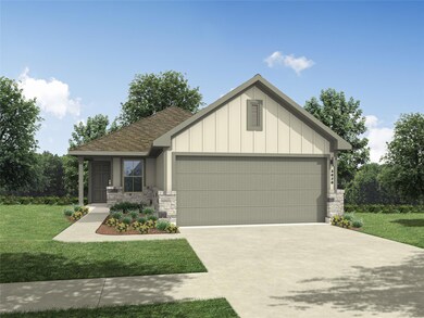 View of front of property featuring an attached g