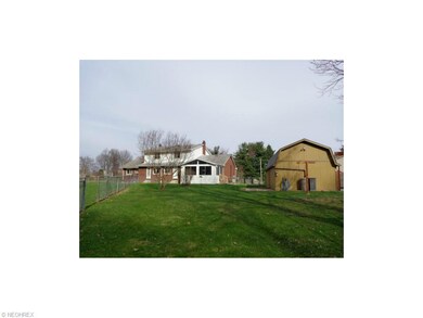 Rear view of the home.  Note the entire first floo