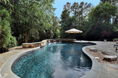 Salt water pool with three water features. A separ
