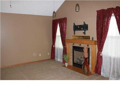 The 14x10.10 Living Room Boasts a Beautiful Gas Fi