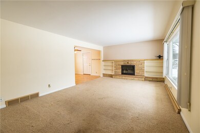 Wood burning fireplace in living room