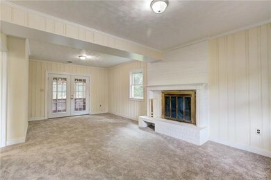 Family room with doors to screen porch.