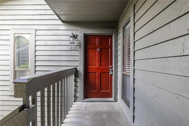 This cozy front porch landing with room for décor 