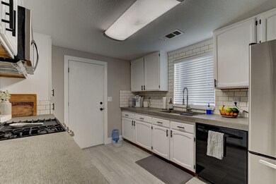 Kitchen w/Concrete Counter tops
