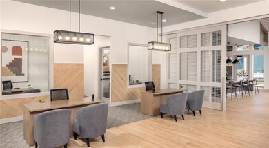 Home office with a chandelier, wood finished floors, and recessed lighting