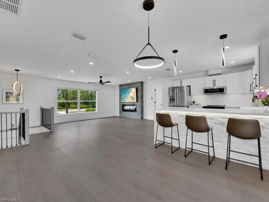 Kitchen with appliances with stainless steel finis