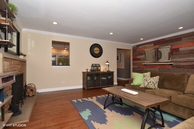 Custom wood wall warms up and modernizes this spac