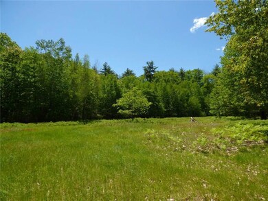Nice open lot ready for your new home.