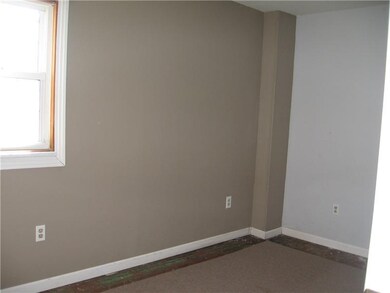 Bedroom. Bright with neutral colors.  Note wood fl