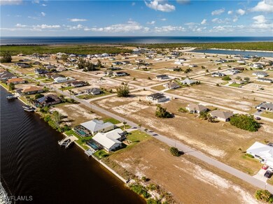 Aerial view of the property and surrounding area