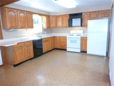 bright kitchen with lots of storage and counter sp
