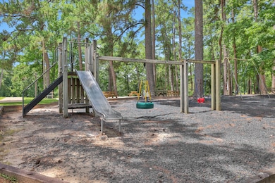 58 N Fairway Loop, Cape Royale, TX 77331 - photo 7