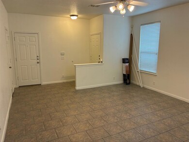 Empty room featuring a ceiling fan and visible ve