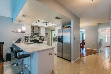 KITCHEN VIEW FROM FAMILY ROOM