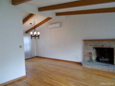 Living Room. beautiful hardwood floors, wood burni