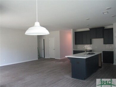 PARTIAL VIEW OF GREAT ROOM FROM KITCHEN