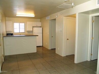 Living room back house, concrete floors