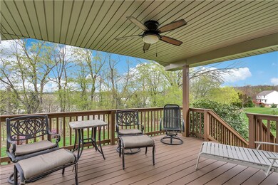 The private covered rear porch was recently painted