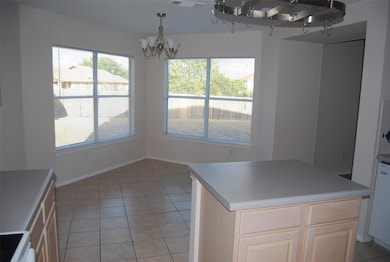 Unfurnished dining area with light tile patterned